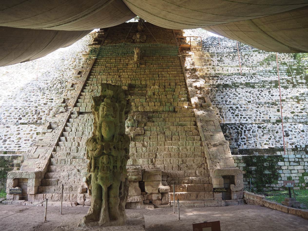 A stone statue in a pyramid

AI-generated content may be incorrect.