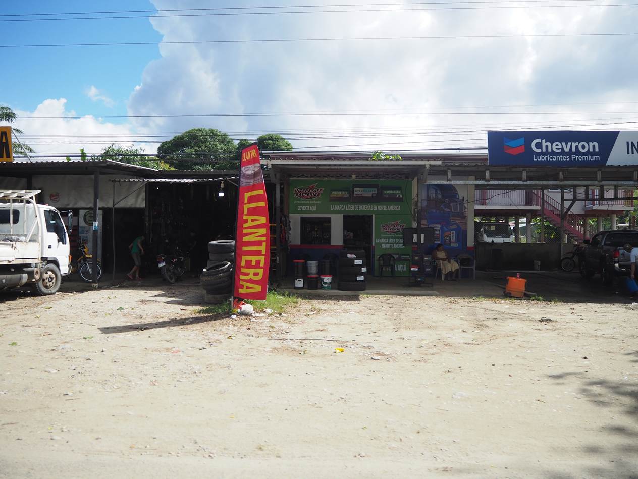 A building with a sign in front of it

AI-generated content may be incorrect.