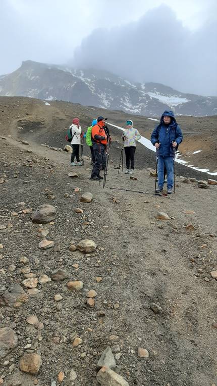 A picture containing outdoor, riding, small, board

Description automatically generated